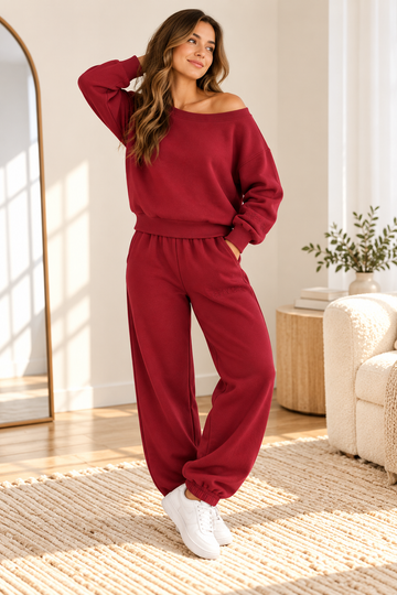 Women's matching off-the-shoulder sweatshirt and joggers set in mulberry wine