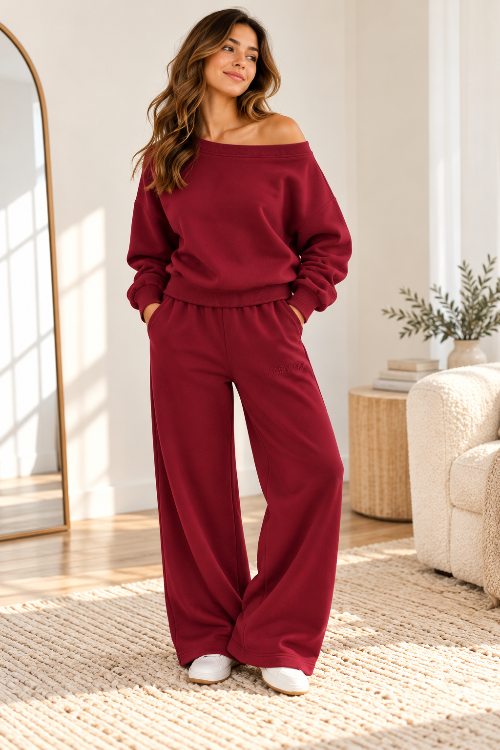 Women's matching off-the-shoulder sweatshirt and sweatpants set in mulberry wine